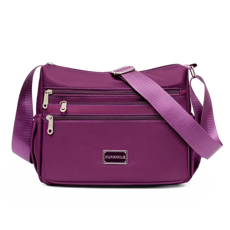Bolsa Feminina Impermeável Millea + Brinde Exclusivo!